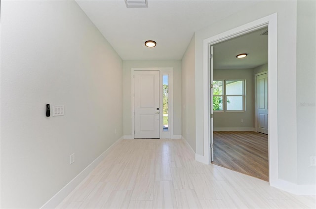 entryway with light hardwood / wood-style flooring