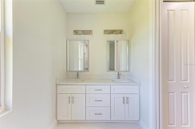 bathroom featuring vanity and tile patterned floors