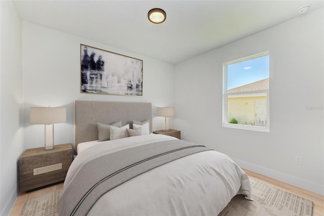 7648 Totem Ave, North Port, FL 34291 - bedroom with wood finished floors and baseboards