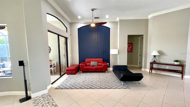 interior space featuring ceiling fan, light tile patterned floors, and ornamental molding