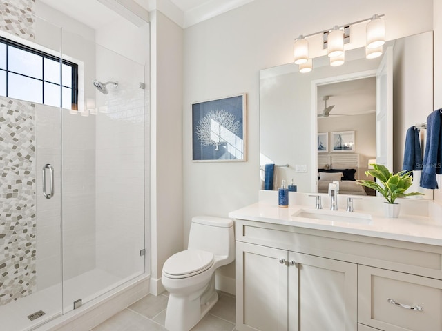 bathroom featuring tile patterned floors, walk in shower, vanity, crown molding, and toilet