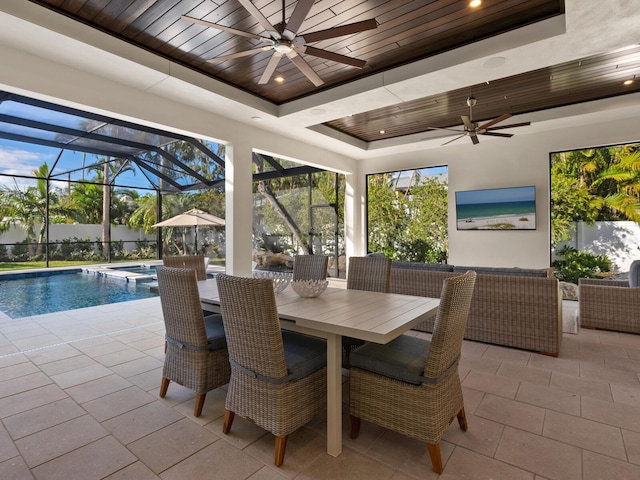 exterior space featuring wood ceiling and a tray ceiling