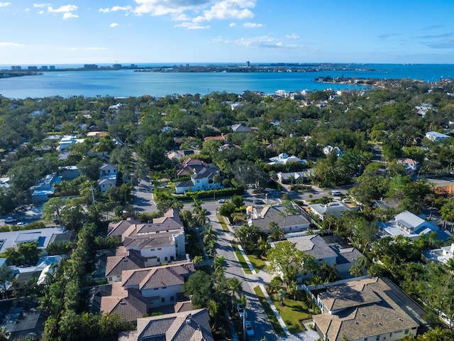 drone / aerial view with a water view