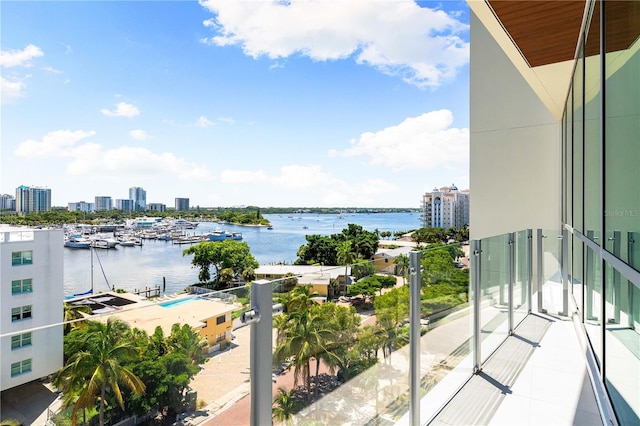 balcony featuring a water view