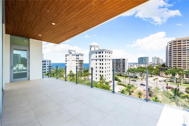 balcony featuring a water view