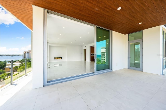 view of patio / terrace with a water view