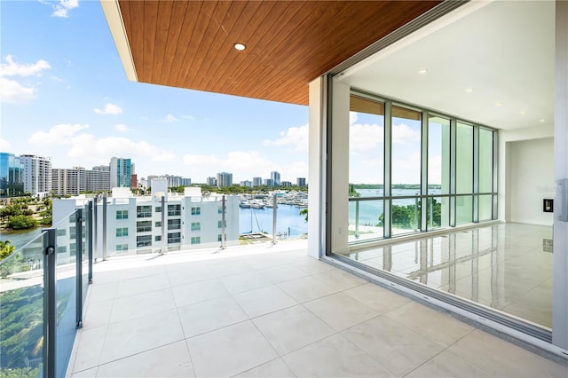 balcony featuring a water view