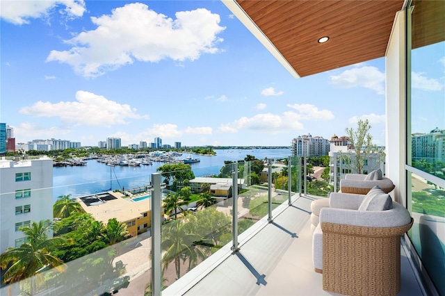 balcony featuring a water view