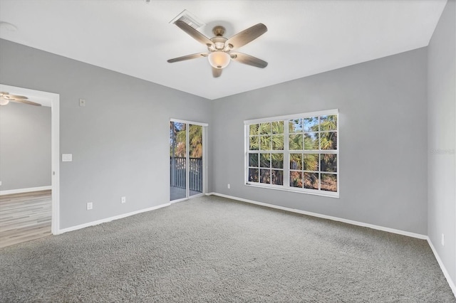 294 Hidden Bay Dr Unit 203, Osprey, FL 34229 - carpeted spare room featuring ceiling fan