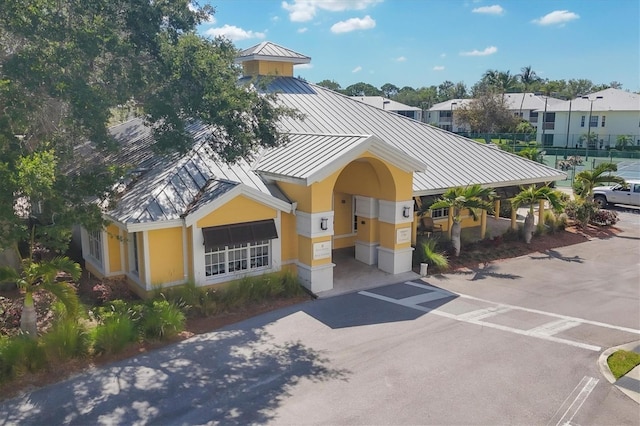 294 Hidden Bay Dr Unit 203, Osprey, FL 34229 - view of property featuring uncovered parking
