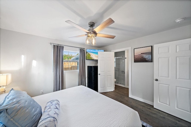 bedroom with ceiling fan and dark hardwood / wood-style floors