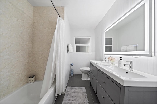 full bathroom with tile patterned flooring, vanity, toilet, and shower / tub combo with curtain