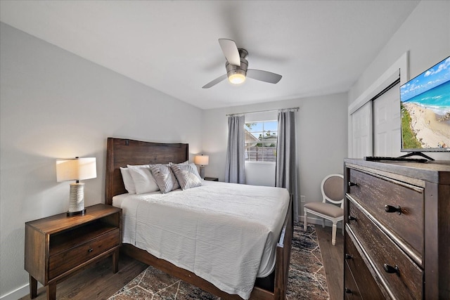 bedroom featuring a closet, ceiling fan, and dark hardwood / wood-style floors