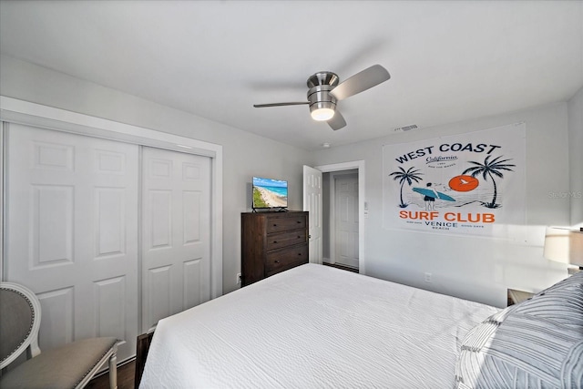 bedroom featuring ceiling fan and a closet