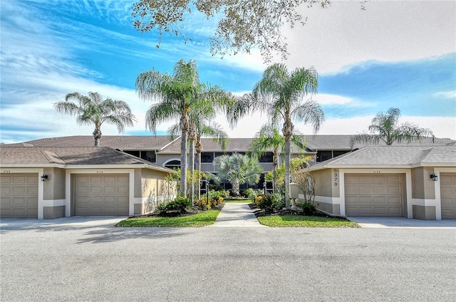 single story home with a garage