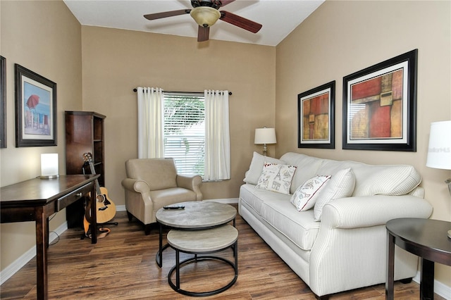 living room with ceiling fan and wood-type flooring