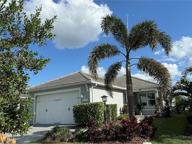 view of front of property featuring a garage