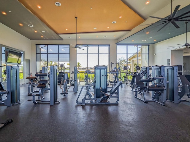 exercise room with ceiling fan