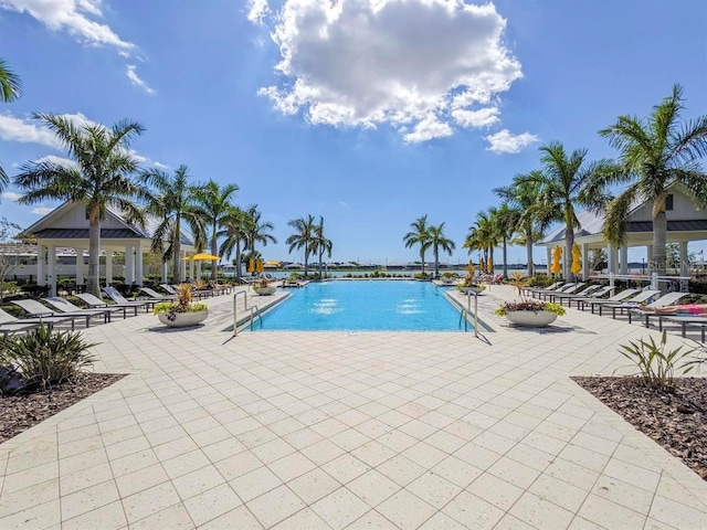 view of swimming pool featuring a patio