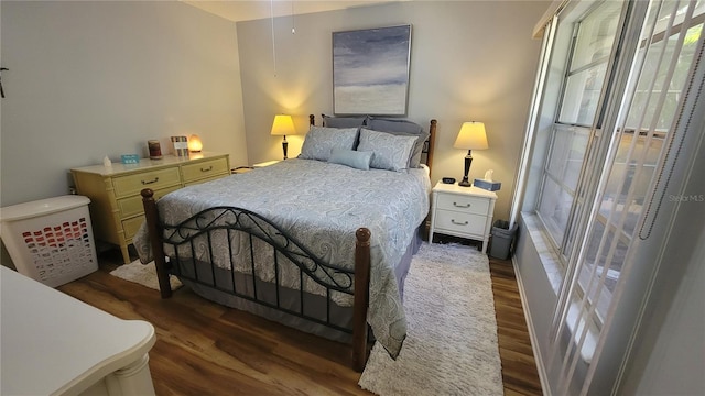 bedroom featuring dark hardwood / wood-style floors