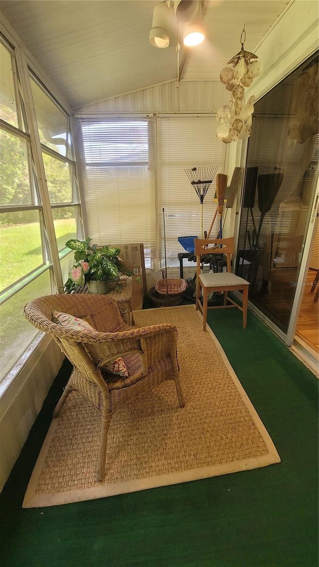 sunroom / solarium with vaulted ceiling