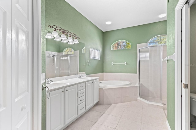 full bathroom featuring vanity, tile patterned flooring, toilet, and plus walk in shower