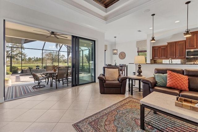 living room featuring light tile patterned flooring and crown molding