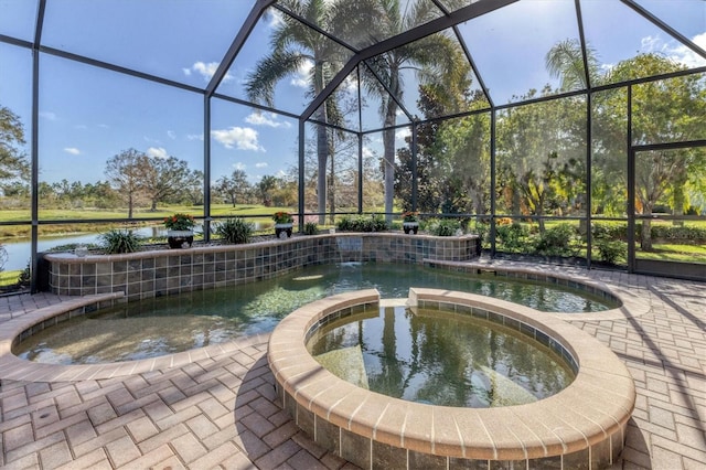 view of swimming pool featuring a lanai, a water view, a patio, and an in ground hot tub