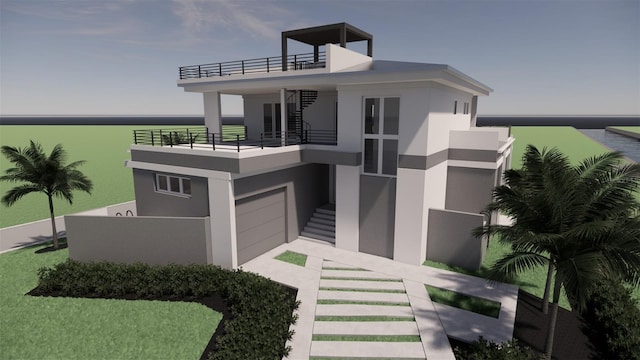 contemporary home featuring a garage and a balcony