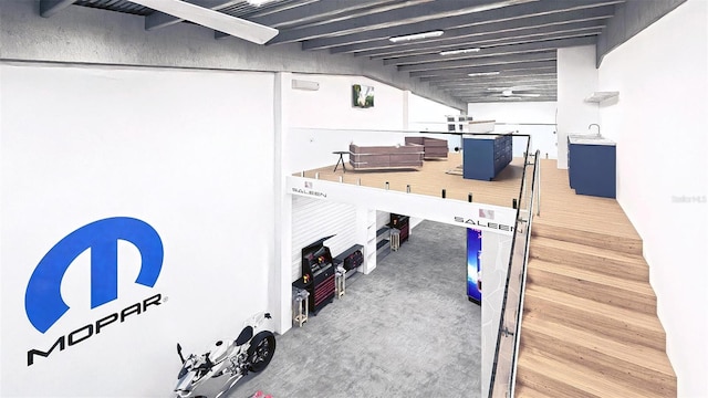 interior space with carpet and basketball hoop