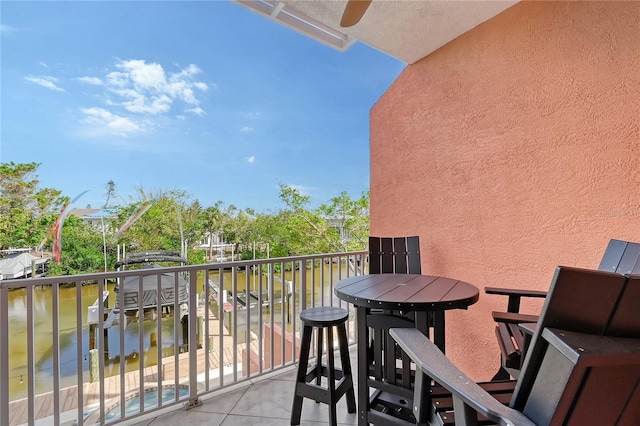 467 Canal Rd Unit 467, Sarasota, FL 34242 - balcony with a water view and outdoor dining space