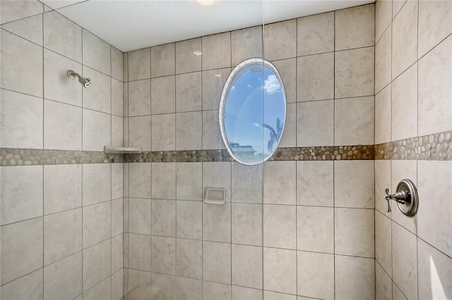 467 Canal Rd Unit 467, Sarasota, FL 34242 - full bathroom featuring tiled shower