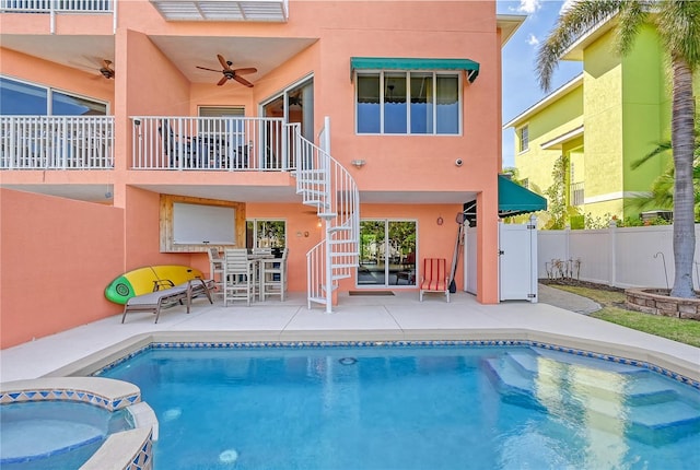467 Canal Rd Unit 467, Sarasota, FL 34242 - view of pool with a ceiling fan, stairs, a patio, and a pool with connected hot tub