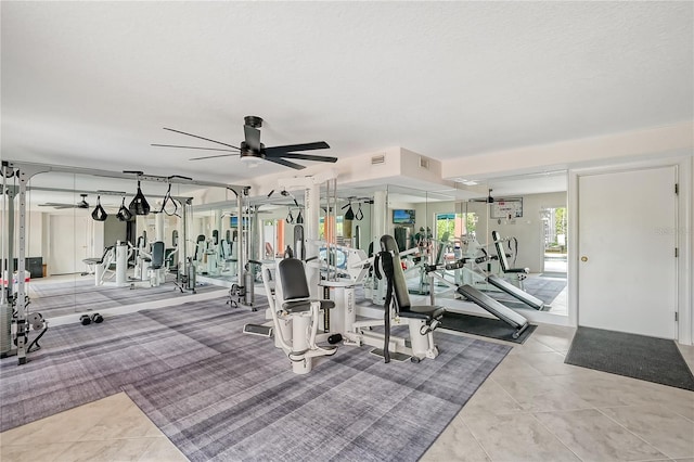 467 Canal Rd Unit 467, Sarasota, FL 34242 - gym featuring ceiling fan, tile patterned floors, and carpet floors