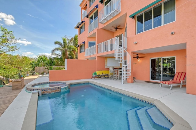467 Canal Rd Unit 467, Sarasota, FL 34242 - view of pool with a ceiling fan, a pool with connected hot tub, and stairway