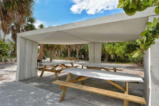 467 Canal Rd Unit 467, Sarasota, FL 34242 - view of community with outdoor dining space and a patio area