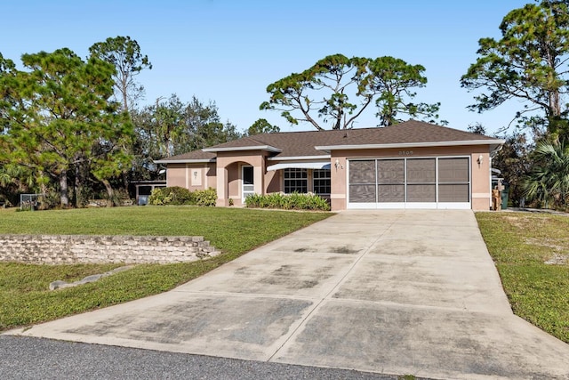 single story home featuring a front yard and a garage