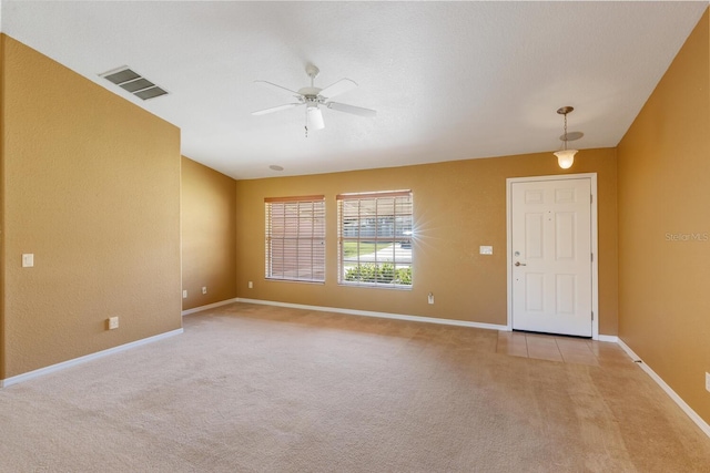 interior space with ceiling fan