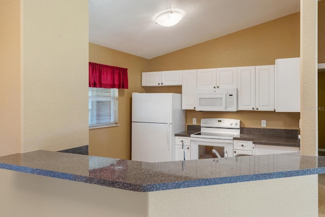 kitchen with white cabinetry, a textured ceiling, white appliances, kitchen peninsula, and lofted ceiling