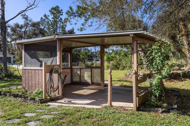 exterior space with a sunroom