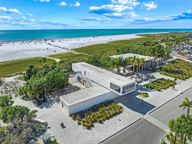 bird's eye view with a view of the beach and a water view