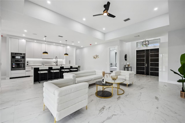 living room with ceiling fan