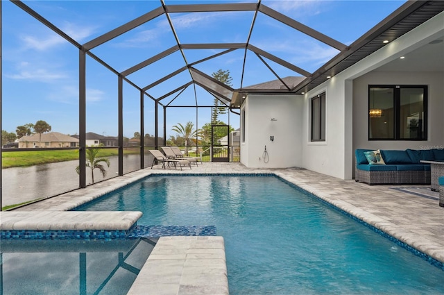 view of swimming pool featuring a patio area, a lanai, and an outdoor living space