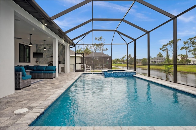 view of pool with an in ground hot tub, an outdoor living space, ceiling fan, a patio, and glass enclosure