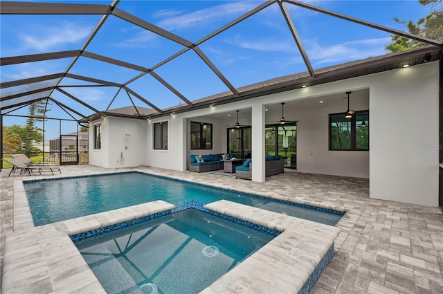 view of pool featuring a lanai, a patio, an outdoor living space, and a ceiling fan