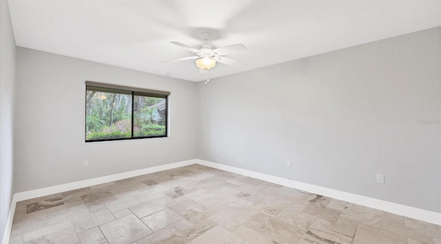 empty room featuring ceiling fan