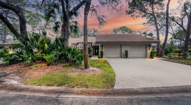 view of front of property featuring a garage