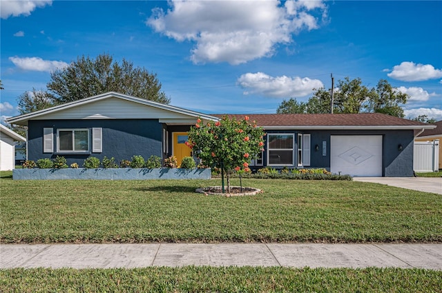 ranch-style house with a garage and a front yard