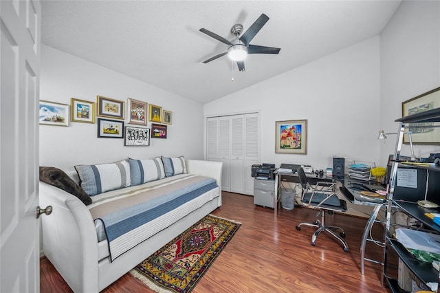 office with dark hardwood / wood-style flooring, lofted ceiling, and ceiling fan