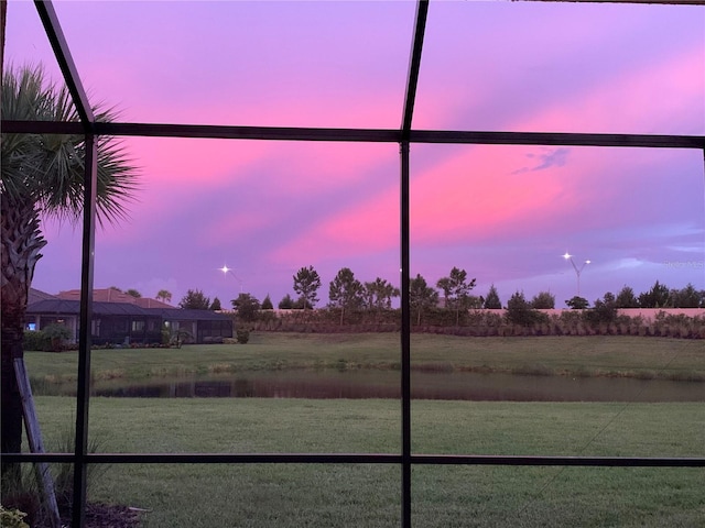 view of yard at dusk